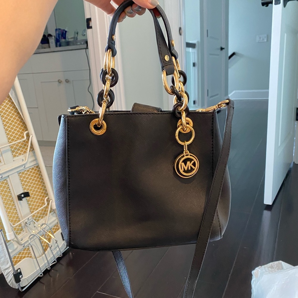 Medium Michael Kors black crossbody/handbag